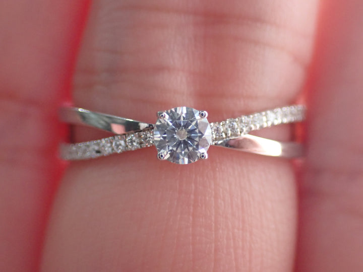 Engagement Ring with a Center Round White Diamond and Round White Side Diamonds | Fête Matrimony XXIII