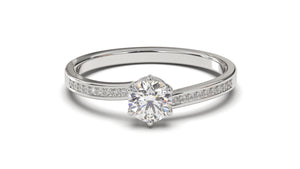 Engagement Ring with a Center Round White Diamond and Round White Diamond Side Stones | Fête Matrimony XII