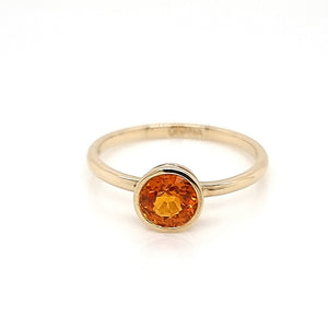 Solitaire Orange Sapphire Ring in Bezel Setting made of 14K Yellow Gold 1.22 TCW