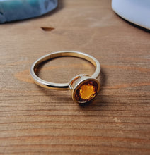 Load image into Gallery viewer, Solitaire Orange Sapphire Ring in Bezel Setting made of 14K Yellow Gold 1.22 TCW
