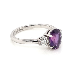 Platinum Ring with 15 Pointer Diamonds on the Side and Oval Purple Sapphire in the Center