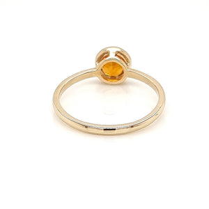 Solitaire Orange Sapphire Ring in Bezel Setting made of 14K Yellow Gold 1.22 TCW